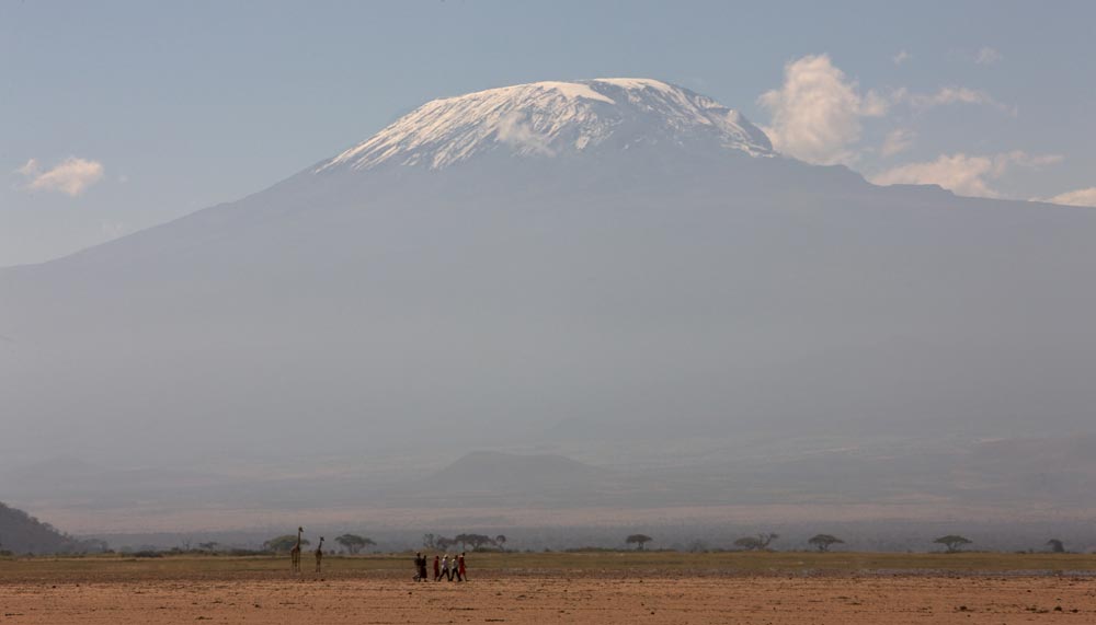Walking-from-our-private-mobile-tented-camp-below-Kilimajaro-Amboseli-Kenya